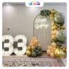بادکنک آرایی تم سبز طلایی